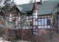 Historic photograph of the Chi Phi Lodge at Cornell University in Ithaca, New York, dating to 1908.