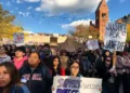 People gather at a protest on Ho Plaza at Cornell University in Ithaca, New York, on October 5, 2026.