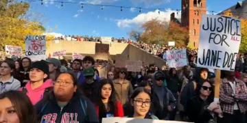 People gather at a protest on Ho Plaza at Cornell University in Ithaca, New York, on October 5, 2026.