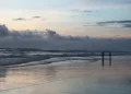 Dusk settles over Cox’s Bazar sea beach in Bangladesh, capturing the coastal landscape on September 14, 2013.