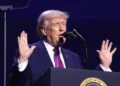 Donald Trump speaking with attendees at the “Build the Red Wall” rally at Dream City Church in Phoenix, Arizona.
