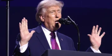Donald Trump speaking with attendees at the “Build the Red Wall” rally at Dream City Church in Phoenix, Arizona.