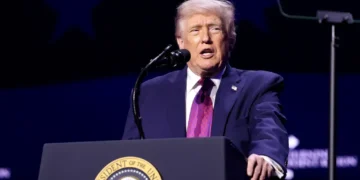 U.S. President Donald Trump speaks with attendees at the “Build the Red Wall” rally at Dream City Church in Phoenix, Arizona, on April 17, 2026.