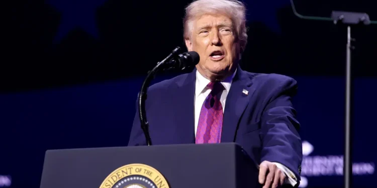 U.S. President Donald Trump speaks with attendees at the “Build the Red Wall” rally at Dream City Church in Phoenix, Arizona, on April 17, 2026.