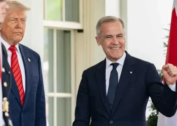 U.S. President Donald Trump greets Canadian Prime Minister Mark Carney at the West Wing entrance of the White House on May 6, 2025.