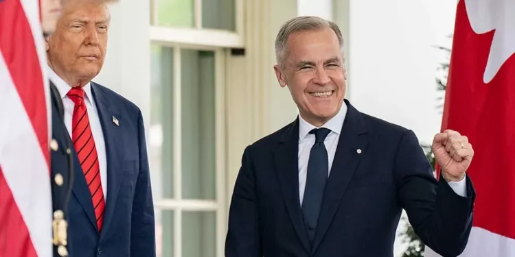 U.S. President Donald Trump greets Canadian Prime Minister Mark Carney at the West Wing entrance of the White House on May 6, 2025.