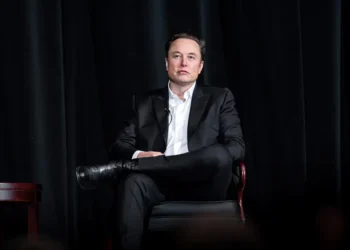 Elon Musk speaks with U.S. Air Force Academy Superintendent Lt. Gen. Richard Clark during a distinguished speaker presentation in Colorado Springs on April 7, 2022.