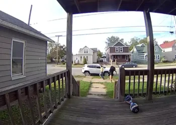 Doorbell-camera footage shows two people running during the October 9, 2026, shooting in Erie, Pennsylvania, as reported by YourErie.
