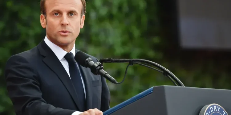 French President Emmanuel Macron speaks during the 75th D-Day anniversary ceremony at Normandy American Cemetery and Memorial in Colleville-sur-Mer, France, on June 6, 2019.