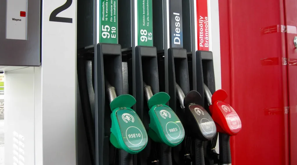 Fuel dispenser at a service station, photographed on June 17, 2016, showing multiple fuel nozzles and dispensing equipment.