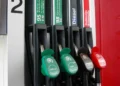 Fuel dispenser at a service station, photographed on June 17, 2016, showing multiple fuel nozzles and dispensing equipment.