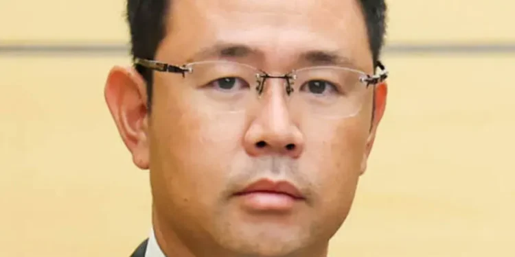 Genta Koja, governor of Okinawa Prefecture and former Naha deputy mayor, photographed during an official meeting documented by Japan’s Prime Minister’s Office on October 7, 2026.