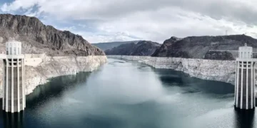 Water intake towers rise from Lake Mead at Hoover Dam on the Nevada-Arizona border, photographed by APK on October 5, 2021.