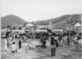 City officials in Hue, Vietnam, arrange coffins before funeral services for victims of the 1968 Tet Offensive, in a U.S. military archival photograph.