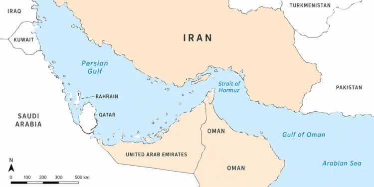 Map showing Iran and the Strait of Hormuz between the Persian Gulf and Gulf of Oman, with neighboring countries and the Arabian Sea labeled.
