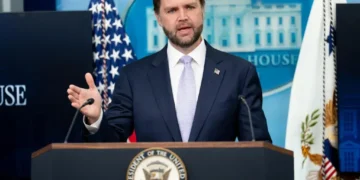 U.S. Vice President JD Vance takes over the White House press briefing on May 20, 2026, during an appearance in the White House briefing room.