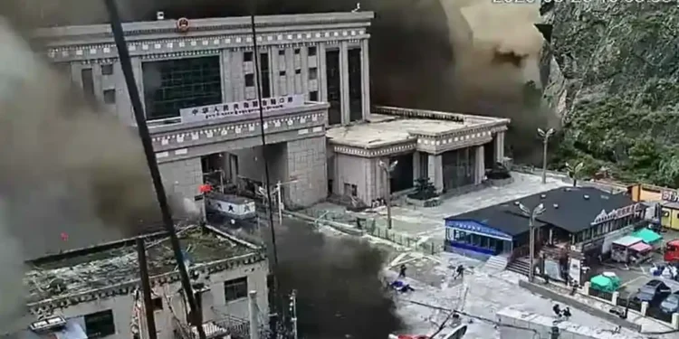 CCTV screenshot showing a mudslide at Gyirong Port during the 2026 Nepal floods, viewed downstream toward the south on August 26, 2026.