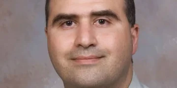 Nidal Hasan photographed at the Uniformed Services University of the Health Sciences in 2007 while serving as a U.S. Army captain.