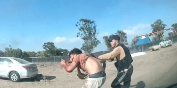 Dashcam image showing a militant kidnapping an Israeli civilian near the Nova music festival site at Re’im, Israel.