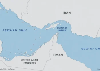 Map showing the Strait of Hormuz connecting the Persian Gulf with the Gulf of Oman, with Iran to the north and Oman and the United Arab Emirates to the south.