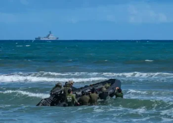 U.S. Naval Special Warfare operators and Japanese Self-Defense Force soldiers navigate a combat rubber raiding craft through surf during Keen Sword 25 near Tokunoshima, Japan, on October 26, 2024.