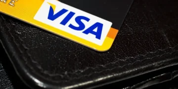 A Visa-branded credit card photographed by Håkan Dahlström on March 16, 2011, illustrating a payment card used for electronic transactions.