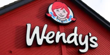 Main Wendy’s restaurant sign above the entrance to the Kingswood location in Kingston upon Hull, England, photographed on January 22, 2024.